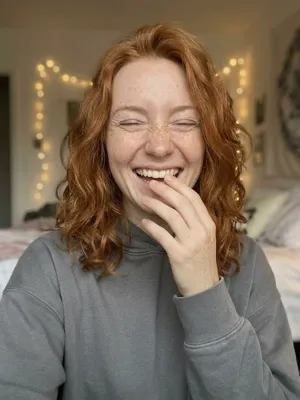 Bella, laughing
